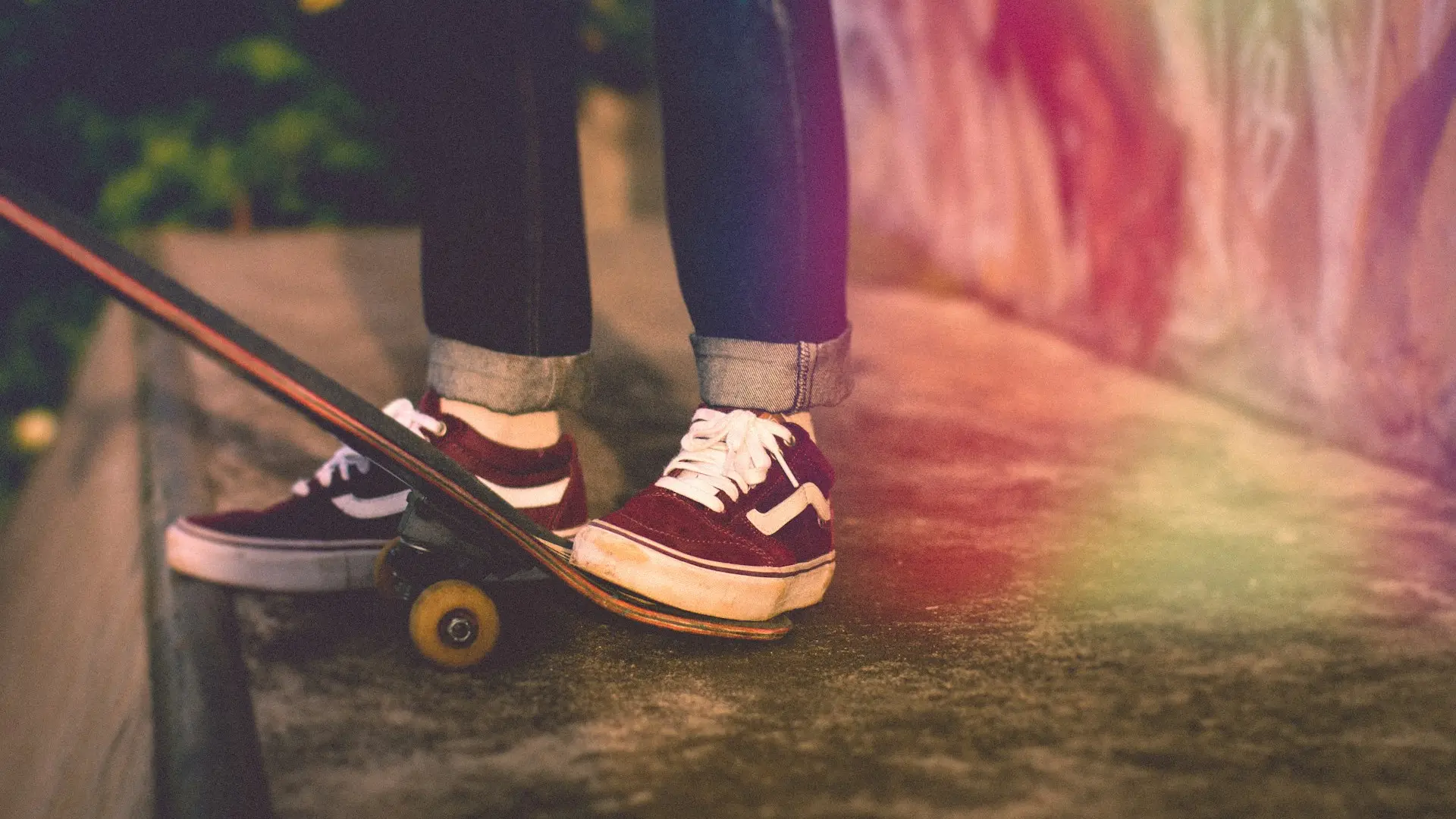 person standing beside skateboard